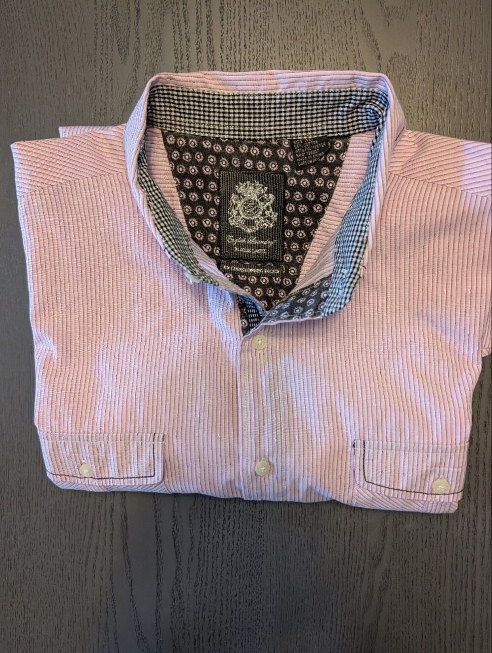English Laundry by Christopher Wicks (featuring the woven silver crest Plaque